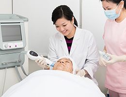 Doctor performing medical aesthetics procedure