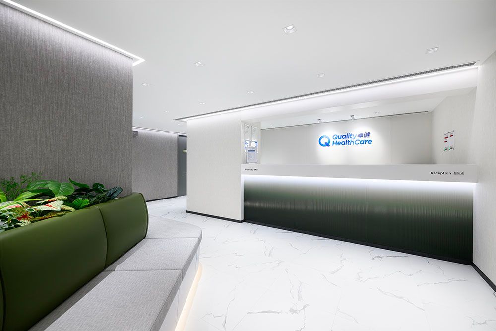 reception with QHMS logo and sofa