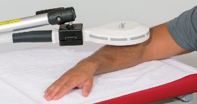High energy inductive therapy to a patient's elbow and forearm