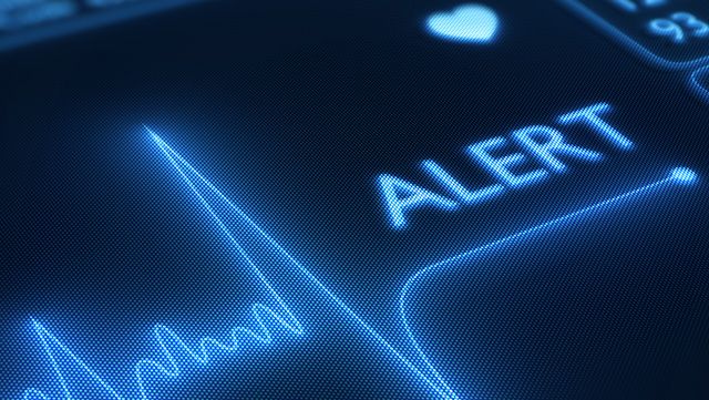 Digital screen showing heartbeat alert