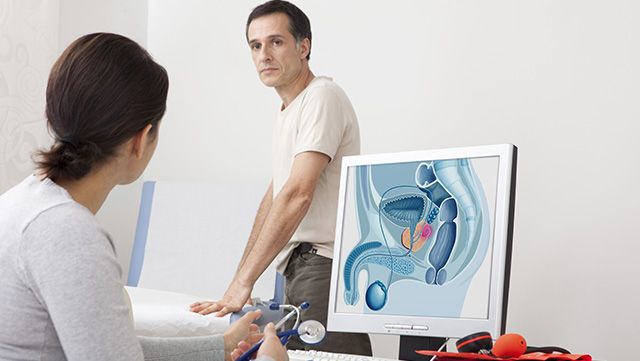 Doctor explaining prostate cancer to a male patient