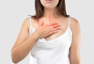 Woman holding her chest with superimposed illustration of the respiratory system