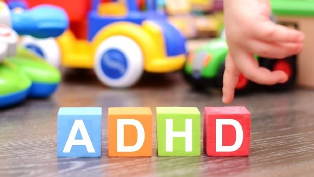 Letters on toy blocks spelling out ADHD