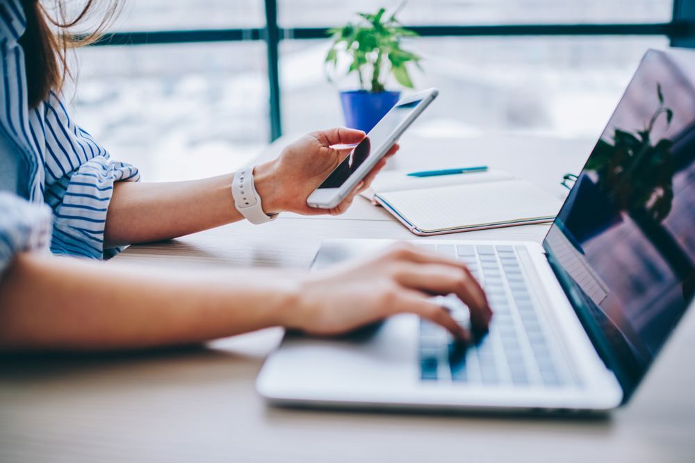 a woman using a laptop