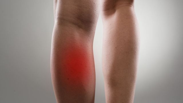 Close-up back view of a painful calf muscle